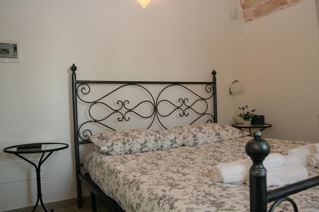 La Dimora Gigante Bed and Breakfast Castellana Grotte Værelse billede